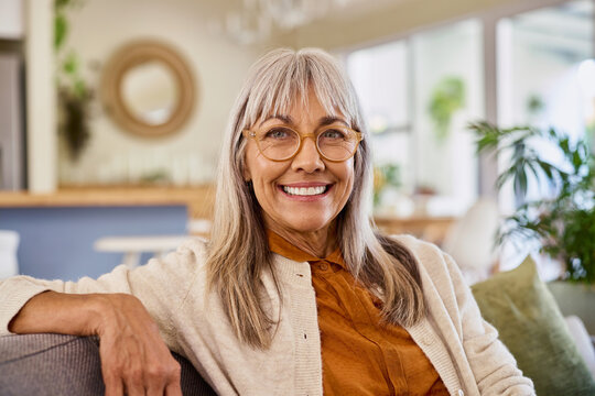 Portrait of senior woman wearing eyeglasses at home
