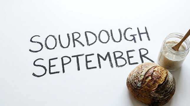 Sourdough September text with fresh artisan bread loaf and active starter culture jar