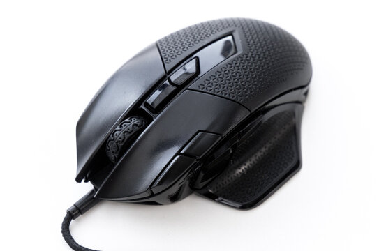 Close up view of a black wired gaming mouse