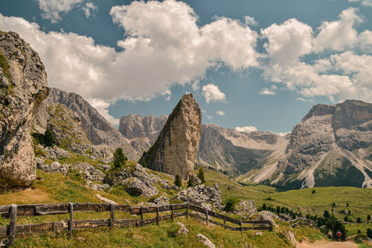 Sass Rigais mountain landscape with hiking trail in Dolomites, Italy.Dramatic alpine landscape with a hiking trail, limestone rock formations and rugged mountain peaks around Sass Rigais in Dolomites