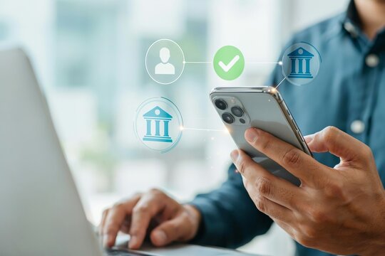 Financial manager performing secure mobile banking transaction with digital network.