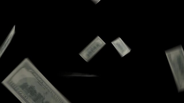 Falling banknotes floating in slow motion isolated on transparent background for finance and wealth concept
