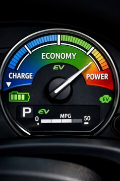 Electric vehicle economy power gauge dashboard with charge meter and mpg display for eco driving interface and efficiency indicator