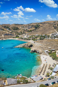Aerial view of the beach and bay of Koundouros, Tzia - Kea island, Cyclades, Greece, with turquoise sea during summer time