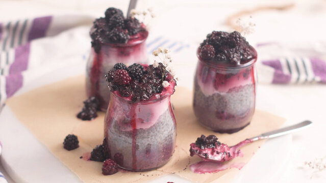 Chia pudding jars with fresh blackberries and berry compote
