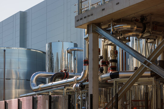 Data center cooling plant under construction with stainless pipework
