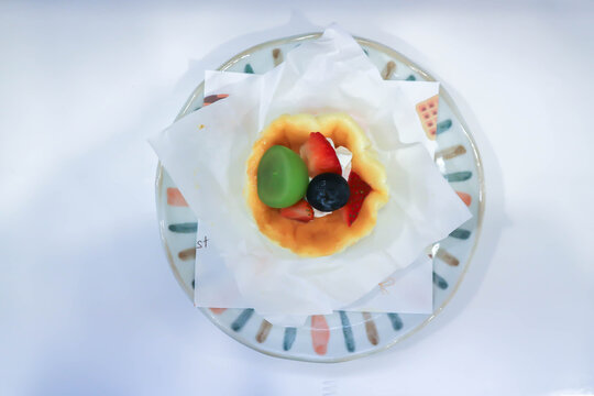 cheesecake with fruit topping or basque cheesecake with fruit topping