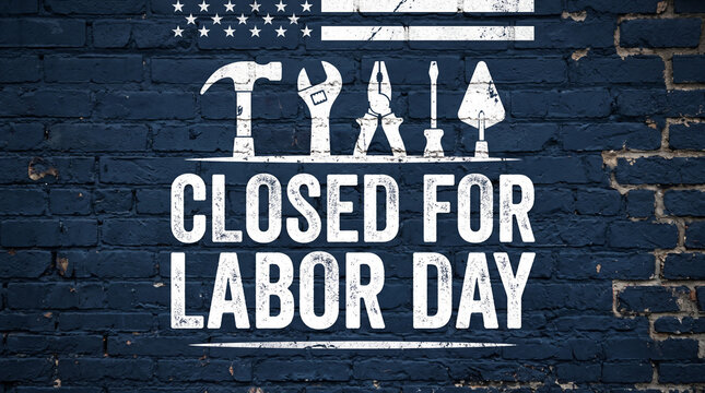 Closed for Labor Day sign with construction tools on dark brick wall background.