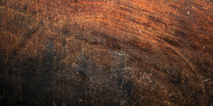 Dark brown wood background with rich grain patterns and rustic weathered surface texture
