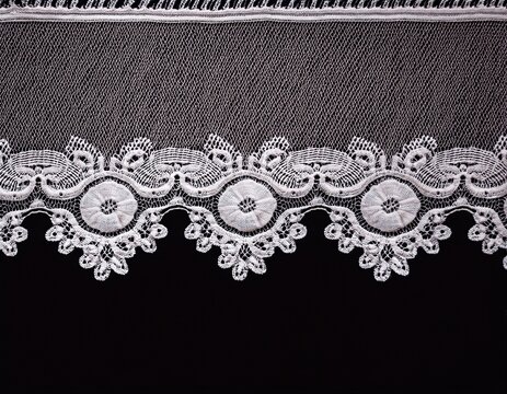 white lace border trim with intricate patterned embroidery detailing elegant vintage textile design