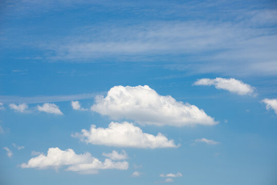 beautiful blue sky and white fluffy cloud horizon outdoor for background.