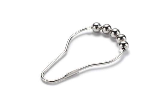 Metal curtain rings with rolling balls on white background, Used to secure curtains to the curtain rod