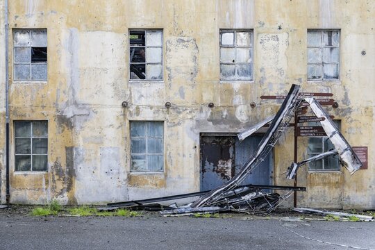 Dilapidated building, historic Devold factory, Devoldfabrikken, outlet center in Langev&aring;g, near &Aring;lesund or Alesund, M&oslash;re og Romsdal Fylke, Norway