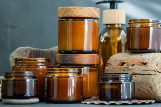 Amber Candles Glass Jars and Bottles with Natural Elements.