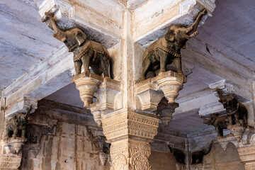 India. Rajasthan. Bundi. Carved elephant-shaped corbels adorning the corner of a pillar at Garh Palace © BTWImages