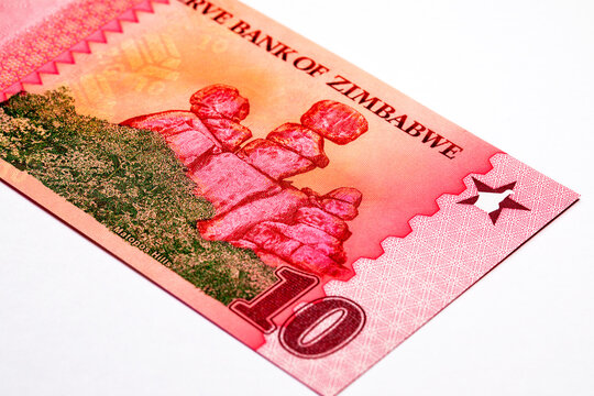 New 10 Zimbabwe ZiG banknote showing Matopos Hills balancing rocks. African currency. World money.