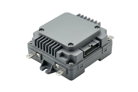 Grey electronic control unit with heat sink isolated on black background