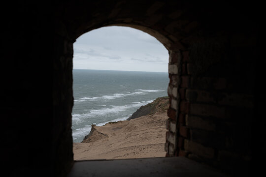 Ocean Horizon Seen Through Stone Archway