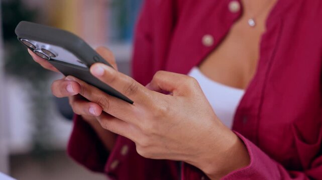 Smartphone hand woman typing message device mobile shirt communication closeup screen touch texting casual indoor social media connection app chat finger technology adult red white blurry background