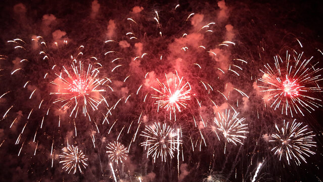 Amazing real beautiful colorful fireworks background on celebration night event for happy new year party, independence day, festivals, Abstract Multi color golden firework in the night sky