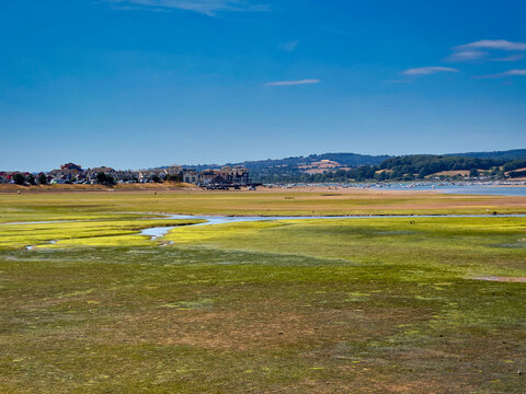 Scenic View of the Exe Estuary at Low Tide with Exmouth Waterfront and Devon Countryside, UK