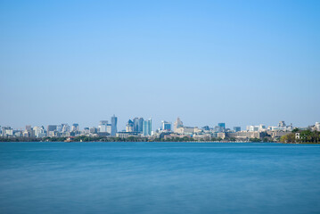 Fototapeta premium Cityscape by West Lake, Hangzhou, Zhejiang, China