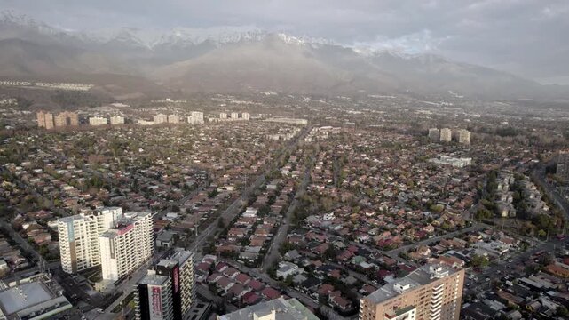 Drone Shot Over Santiago De Chile Residential Area With Mountain Range Background 