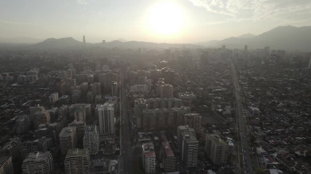 Aerial View Of Santiago De Chile Capital And Mountains Under Hazy Sun