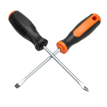 Two screwdrivers crossed with orange and black handles isolated on white background