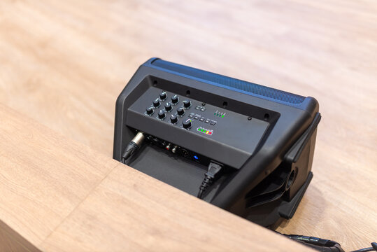 Conference microphone system on wooden table
