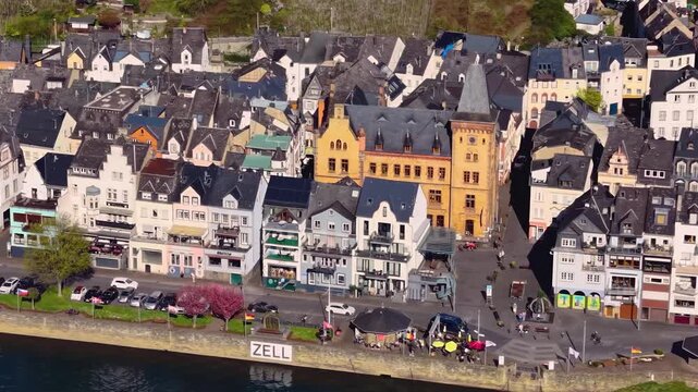 Aerial view of the city and old town above Zell beside the river Mosel in Germany on a sunny spring day

