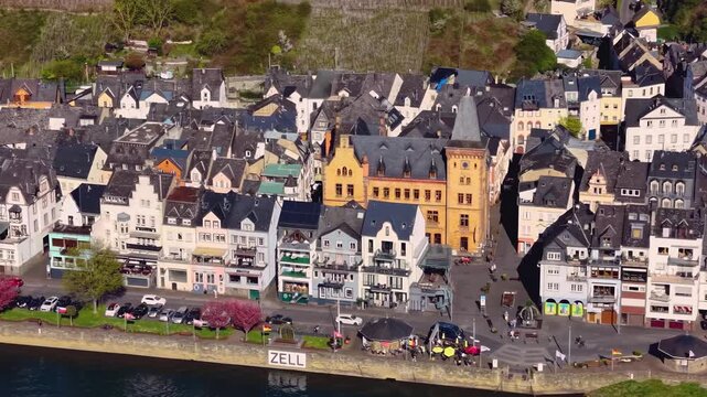 Aerial view of the city and old town above Zell beside the river Mosel in Germany on a sunny spring day
