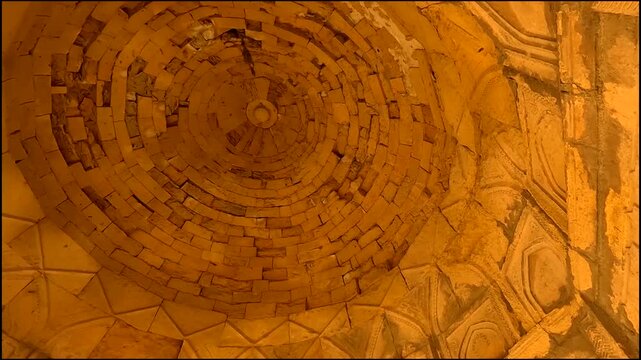 Interior View of Ancient Weathered Stone Dome Ceiling 