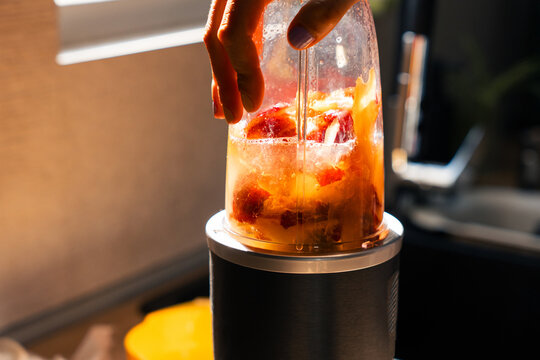 Preparing Fresh Fruit Smoothie in Blender