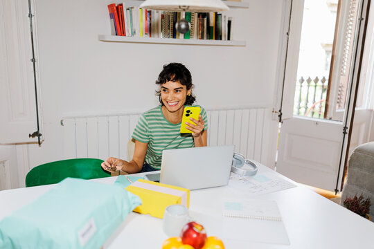 Woman checking online order tracking on phone ugc