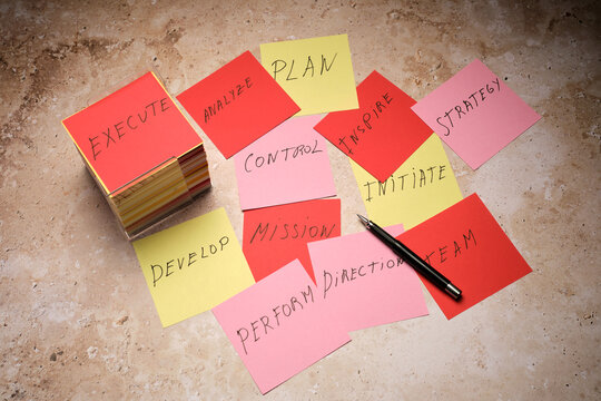 Sticky Notes and a Pen on a Table for Planning and Teamwork Ideas