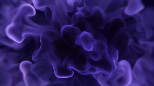 Dense indigo plasma churns and reshapes with intertwined luminous tendrils, glowing in deep violet against near-black darkness for an intense cosmic abstract motion background.