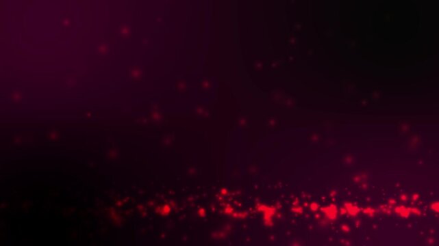 Abstract red glowing particles floating on a dark background with subtle sparkle and light motion. Ideal for luxury, awards, and event visuals.