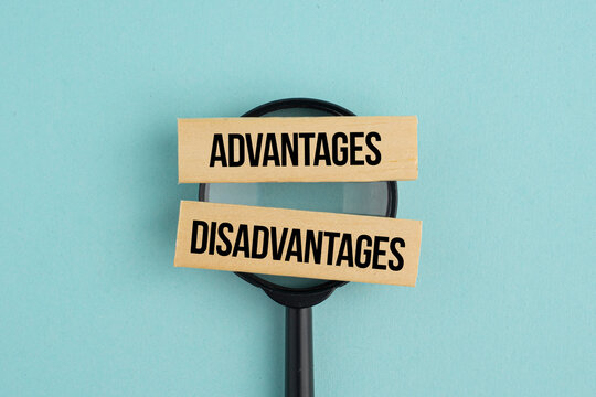 A magnifying glass with the words Advantages and Disadvantages. The concept of advantage or disadvantage of something.