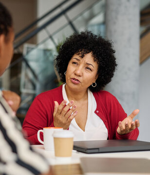 Group of young businesspeople having a meeting or presentation and seminar in the office. Portrait of a young businesswoman talking