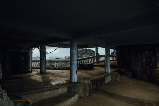 Aged stone pavilion terrace on a cliff side at Wat Tham Suea in Krabi, Thailand