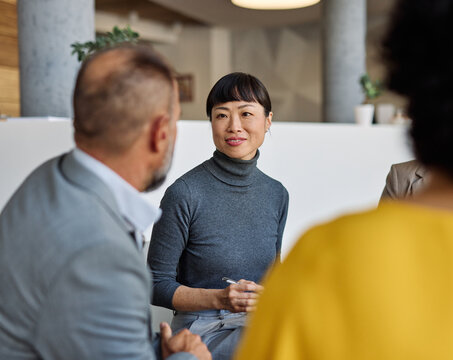Group psychotherapy. Persons sitting in circle and talking. People meeting. Psychotherapy training, business lecture or conference. Man woman support group