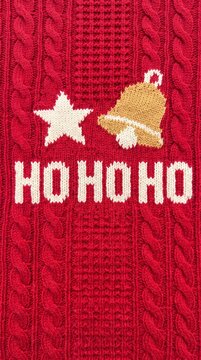 red christmas sweater with ho ho ho text, star and bell design, winter holiday decoration