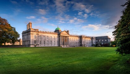 Fototapeta premium scenic view of trinity college dublin at dusk historic tranquil