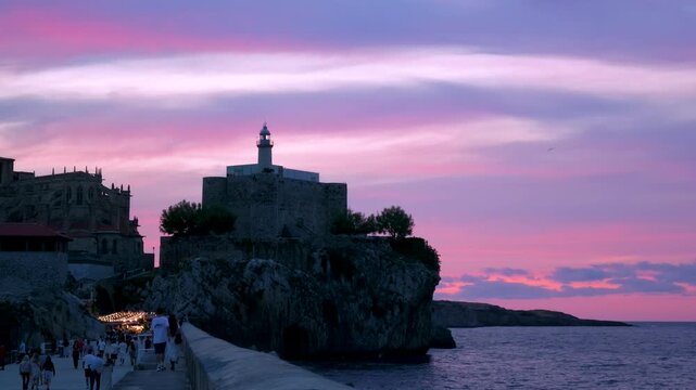 Lighthouse of the Castillo de Santa Ana in the coastal city of Castro Urdiales in the Eastern Coast region of the Autonomous Community of Cantabria, Spain, Europe
