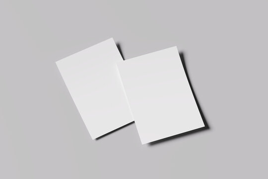 White blank sheets of a4 paper size or documents mockup on a gray background. Template for design blank paper sheets