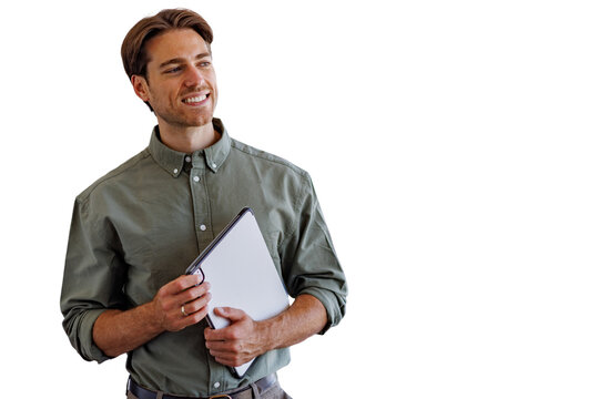 Young man smiling and holding a digital tablet, looking away with confidence, transparent background