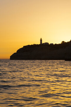 Sailing along the coast of Algarve at sunset, Portugal