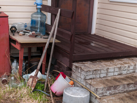 trash left outside a porch