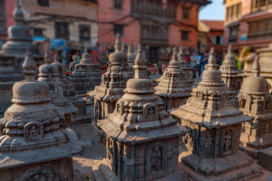 Many ancient stone votive stupas in Kathmandu Nepal with copy space